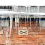 Why Ice Dams Develop on Roofs and How Homeowners Can Prevent Seasonal Damage